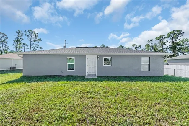a view of a backyard with a garden
