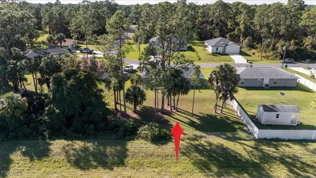 a view of swimming pool with a yard