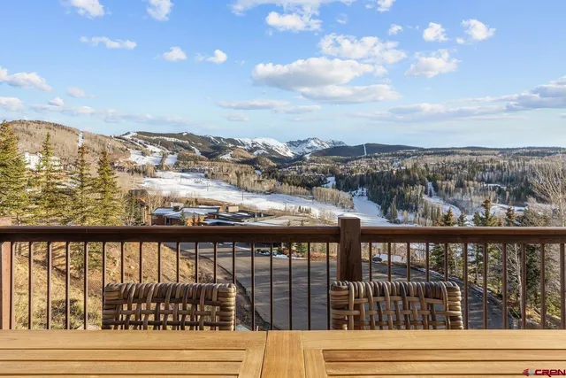a view of a city from a balcony