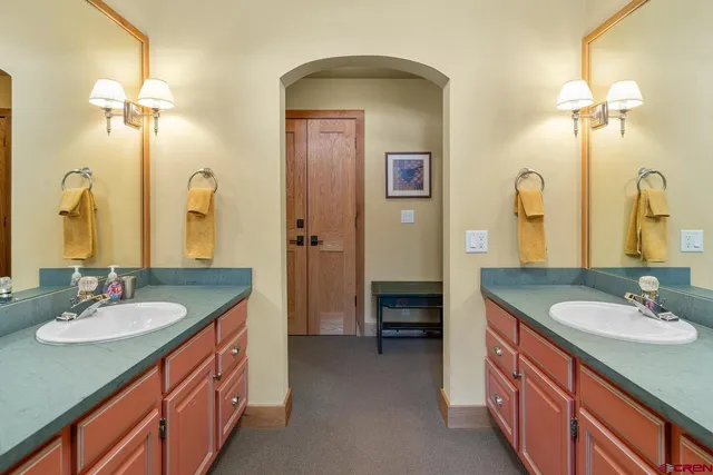 a view of an empty room with a fan