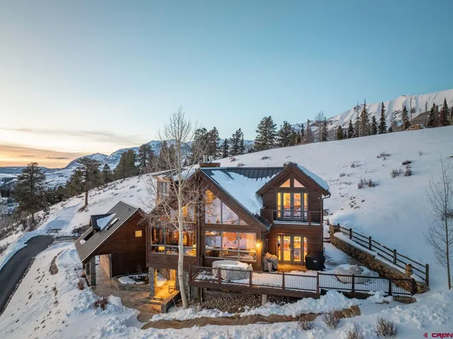 a view of roof with wooden fence