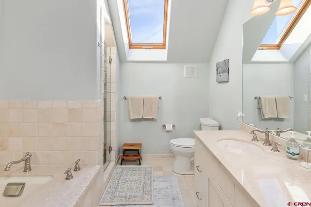 a bathroom with a sink and a toilet