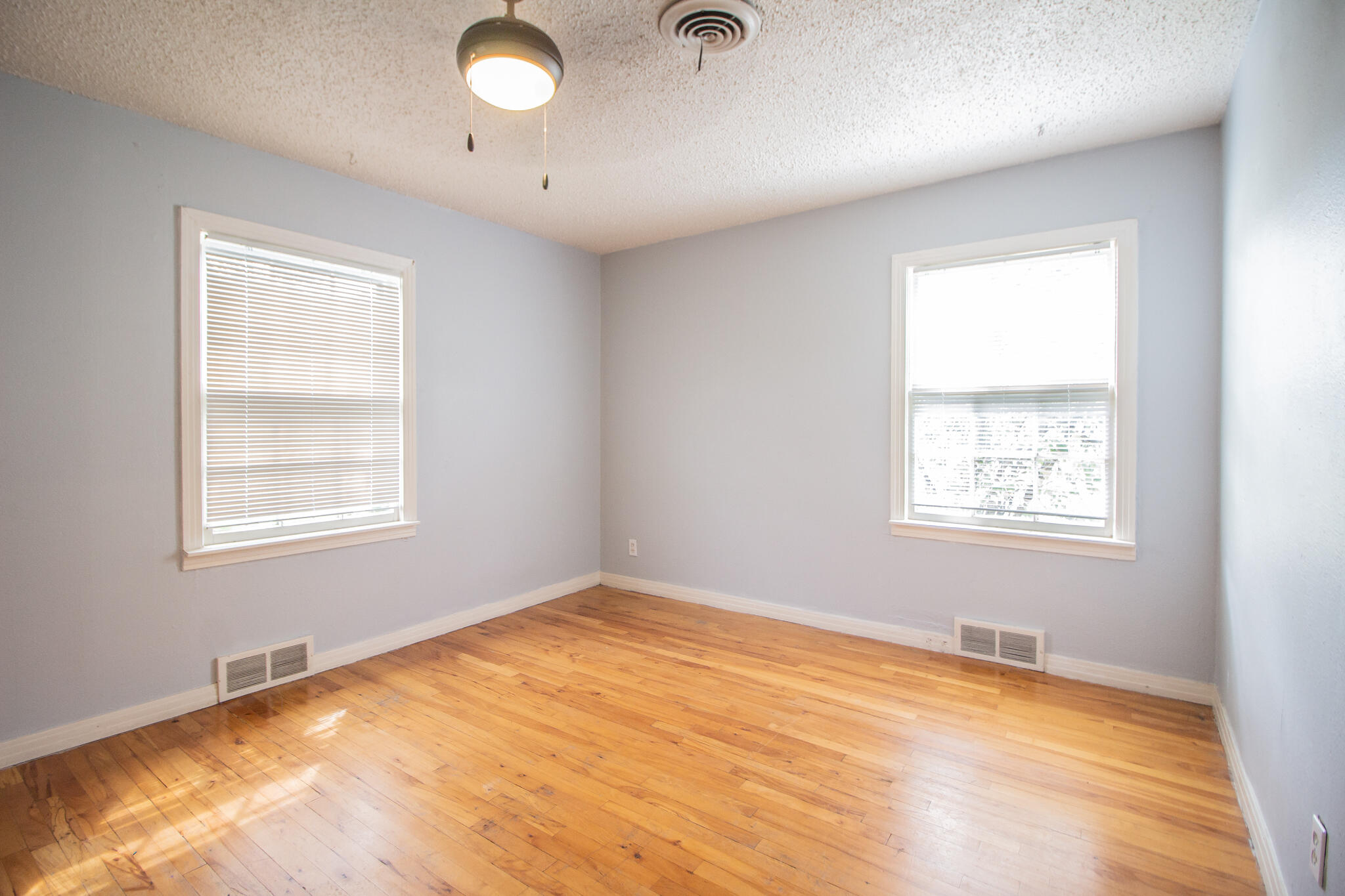 3214 27th Street Lubbock, TX 79410 - Photo 13 of 19 a view of an empty room with a window