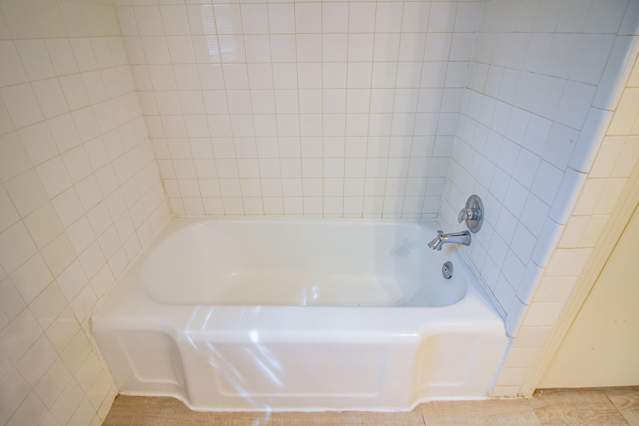 3214 27th Street Lubbock, TX 79410 - Photo 15 of 19 a bathroom with a bathtub
