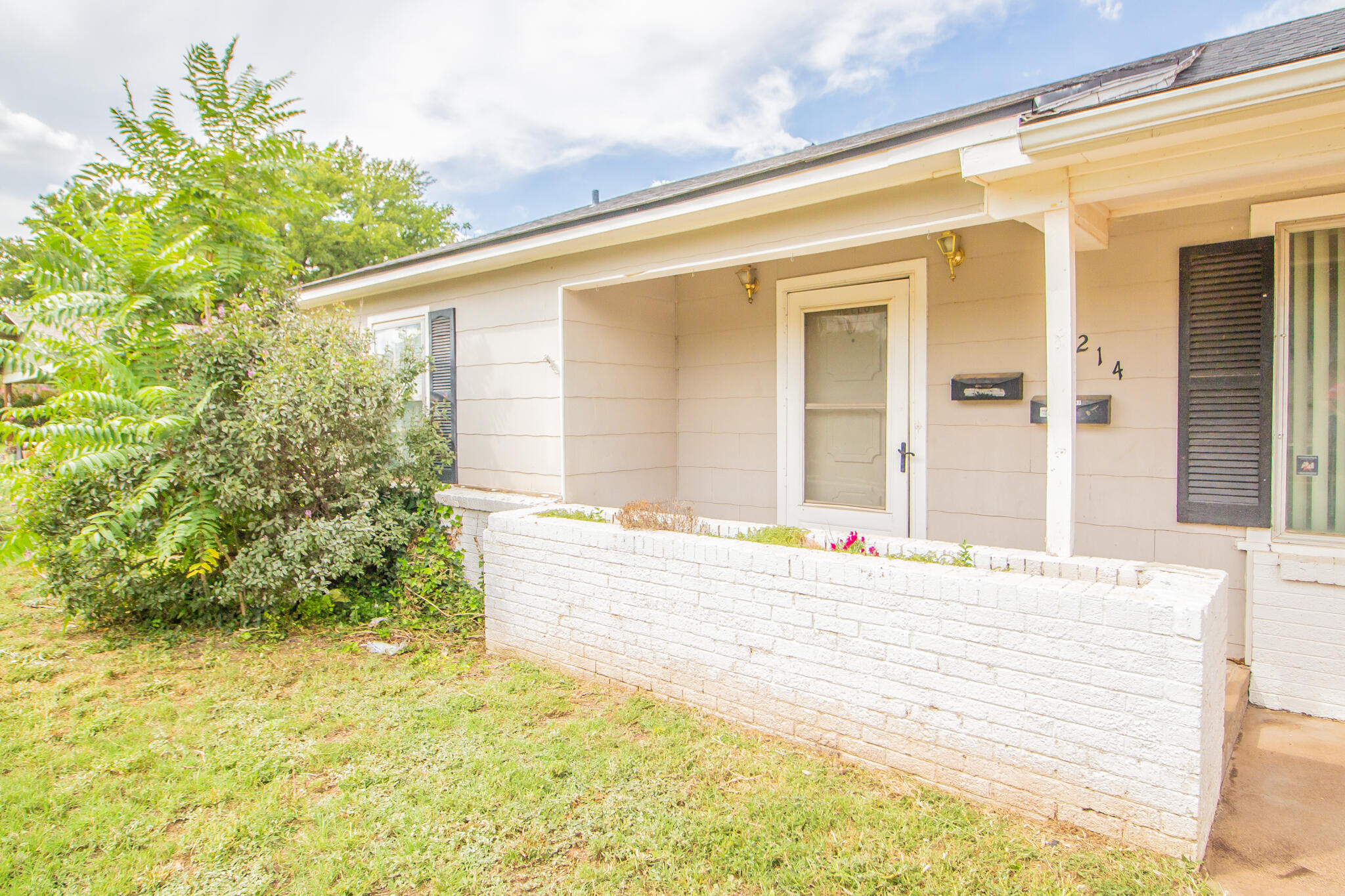 3214 27th Street Lubbock, TX 79410 - Photo 2 of 19 a view of a house with a backyard