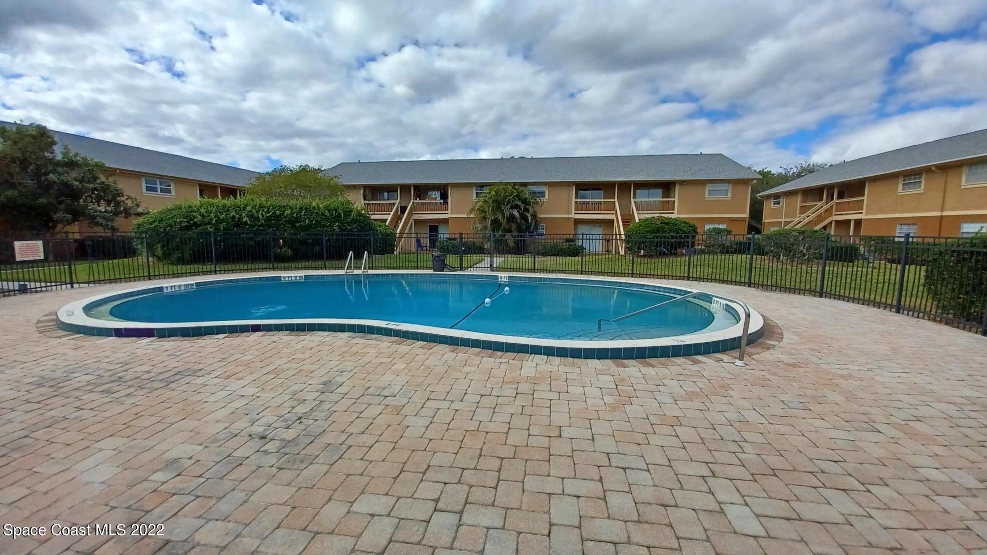 181 Ulster Lane Melbourne, FL 32935 - Photo 18 of 29 a view of pool with a yard