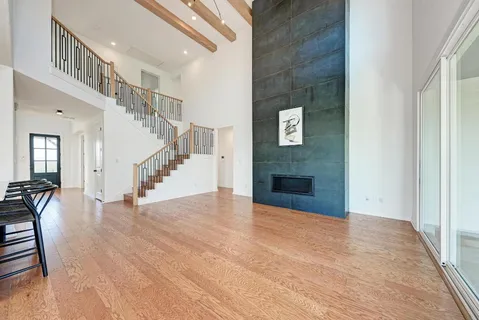 a view of a livingroom with furniture and wooden floor