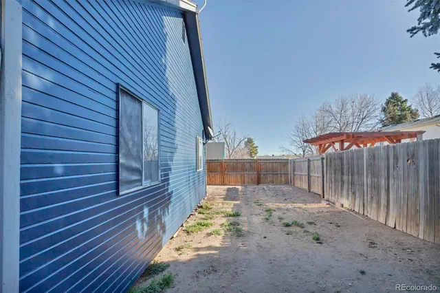 a view of a backyard with door
