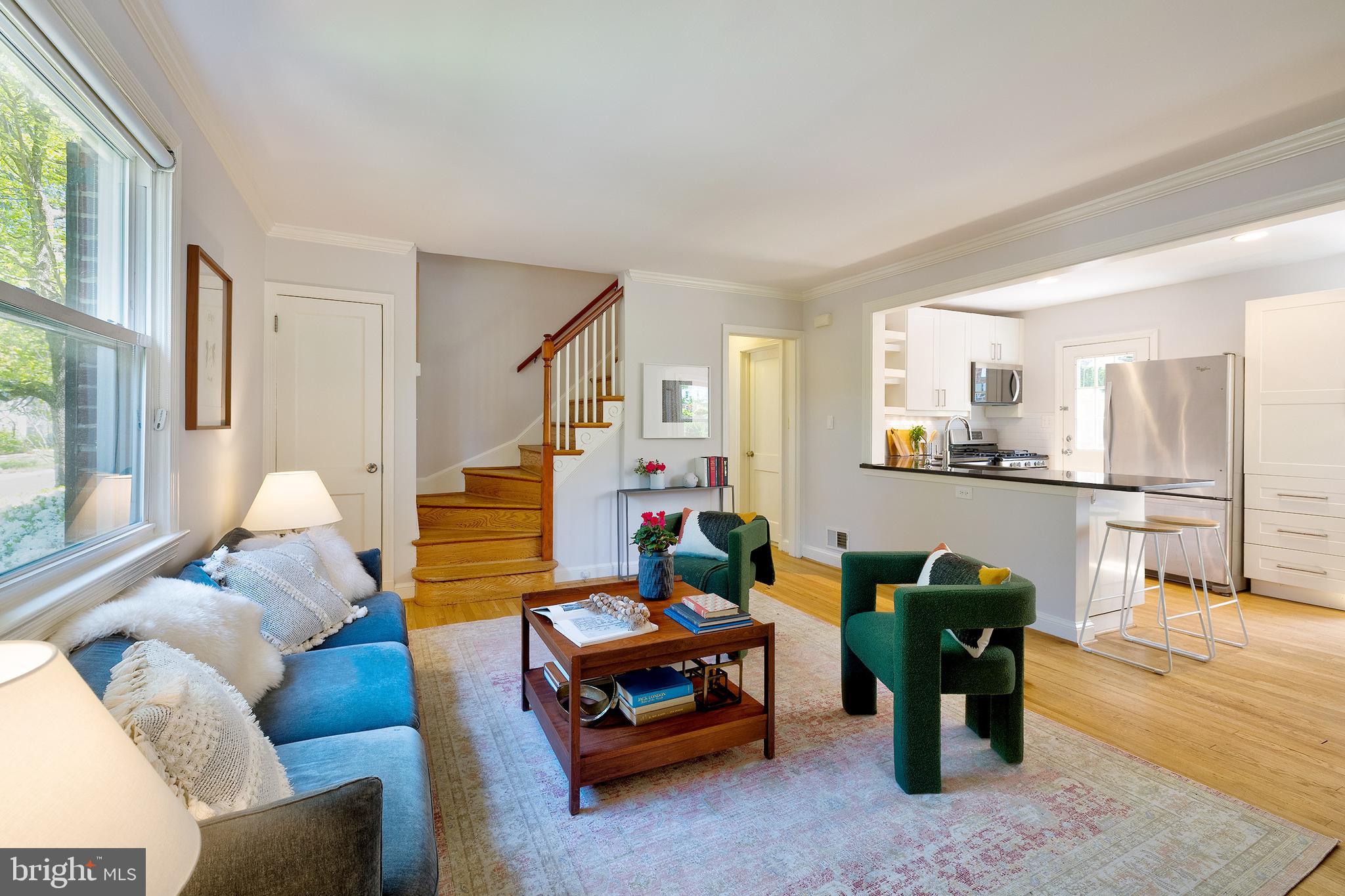 a living room with furniture and a table