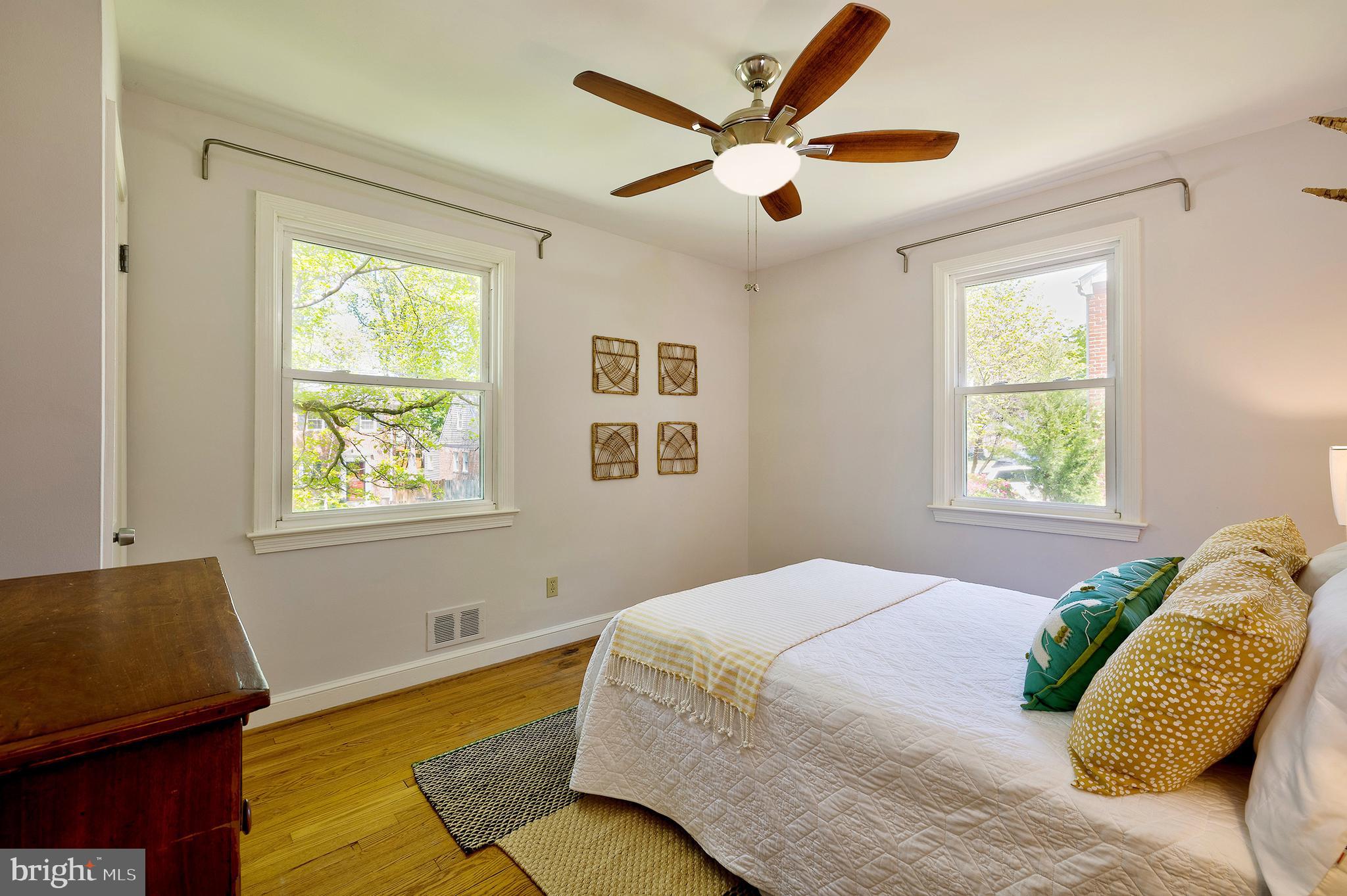 1730 Dublin Drive Silver Spring, MD 20902 - Photo 19 of 50 a bedroom with a bed and a window