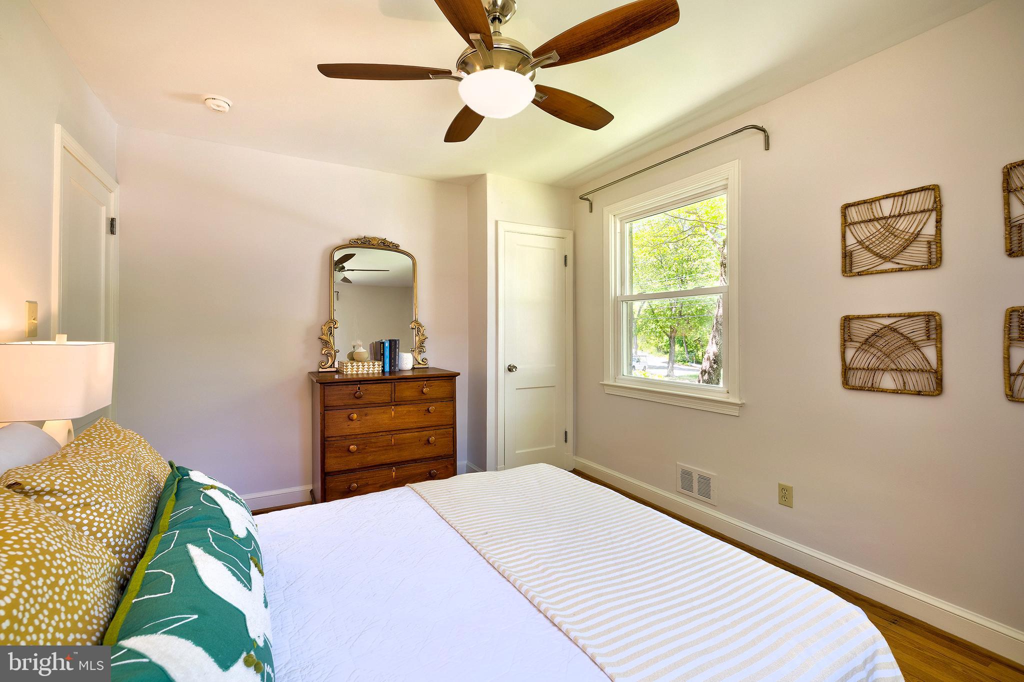 1730 Dublin Drive Silver Spring, MD 20902 - Photo 20 of 50 a bedroom with a bed and a dresser