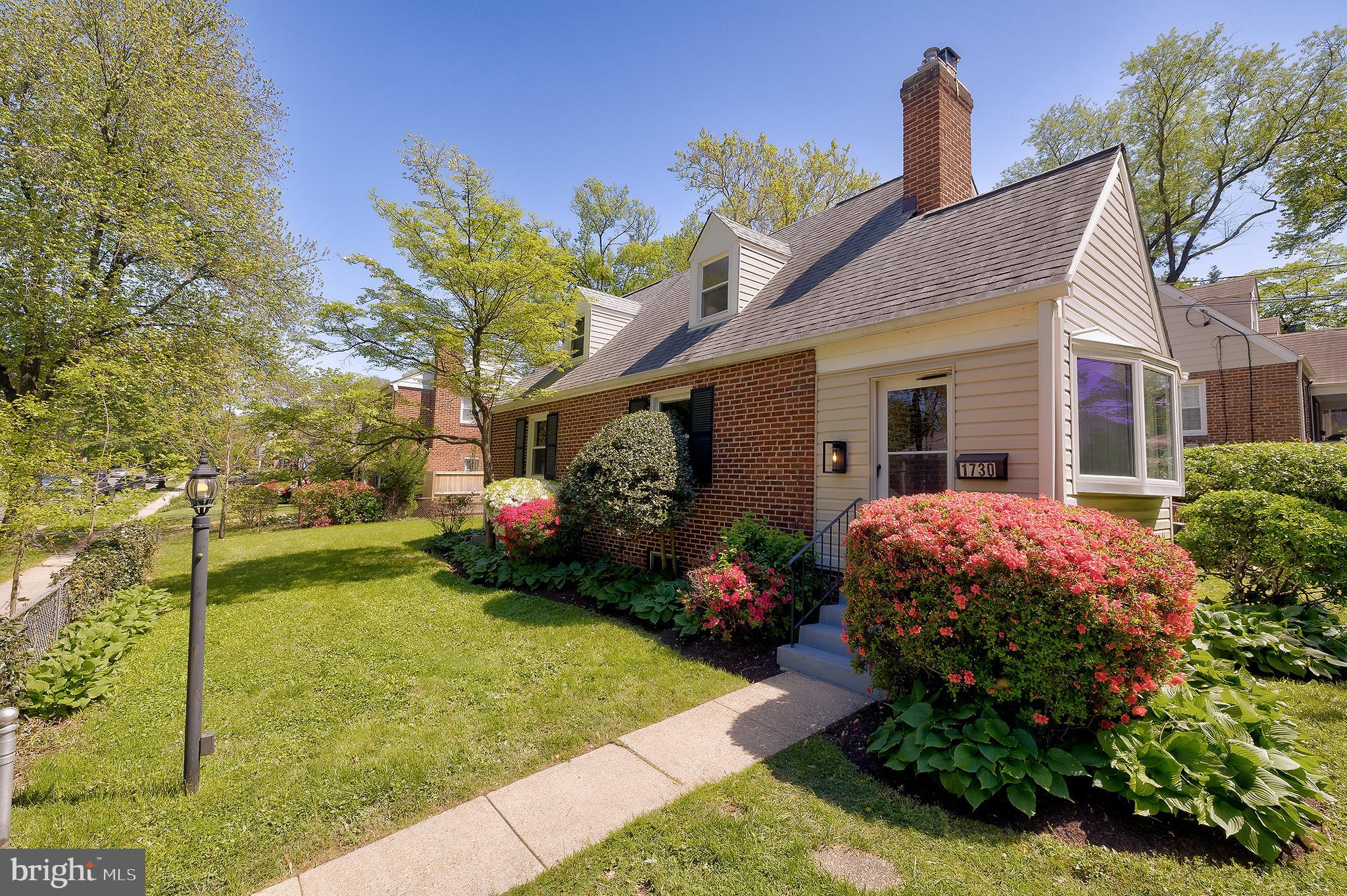 1730 Dublin Drive Silver Spring, MD 20902 - Photo 3 of 50 a front view of a house with garden