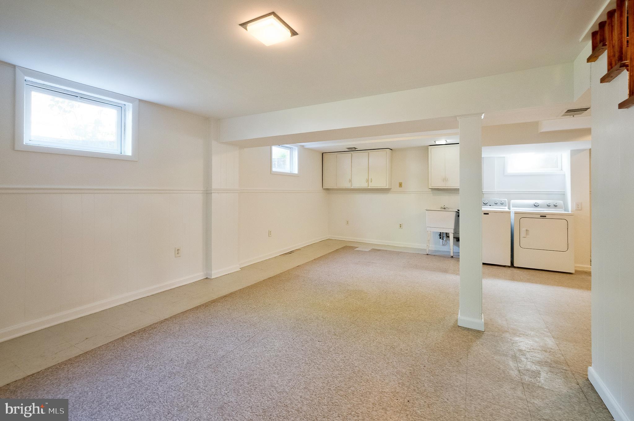 1730 Dublin Drive Silver Spring, MD 20902 - Photo 37 of 50 an empty room with a empty space and windows