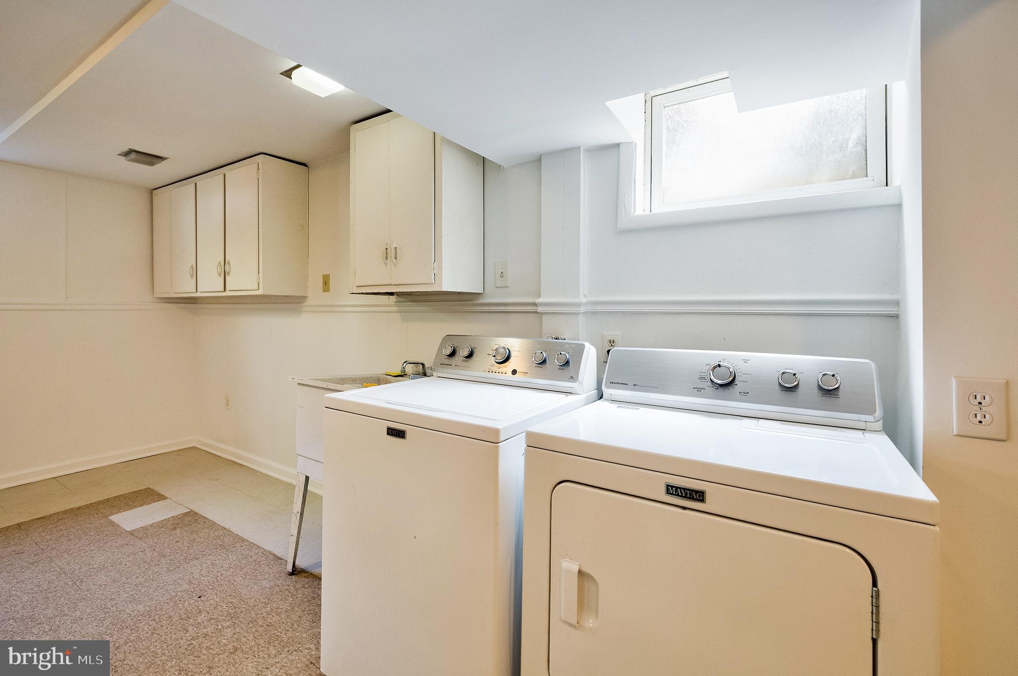 1730 Dublin Drive Silver Spring, MD 20902 - Photo 40 of 50 a utility room with dryer and washer