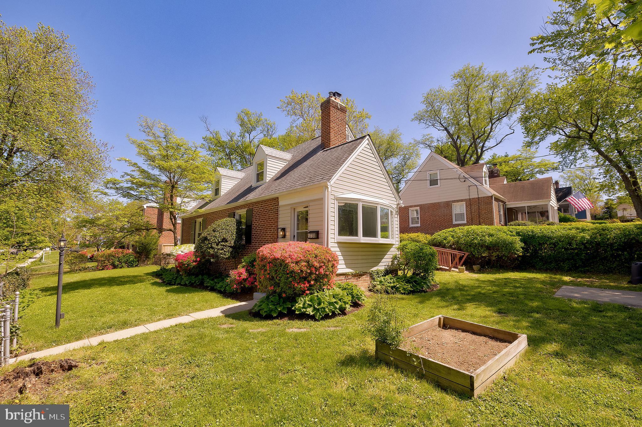1730 Dublin Drive Silver Spring, MD 20902 - Photo 4 of 50 a front view of a house with a yard