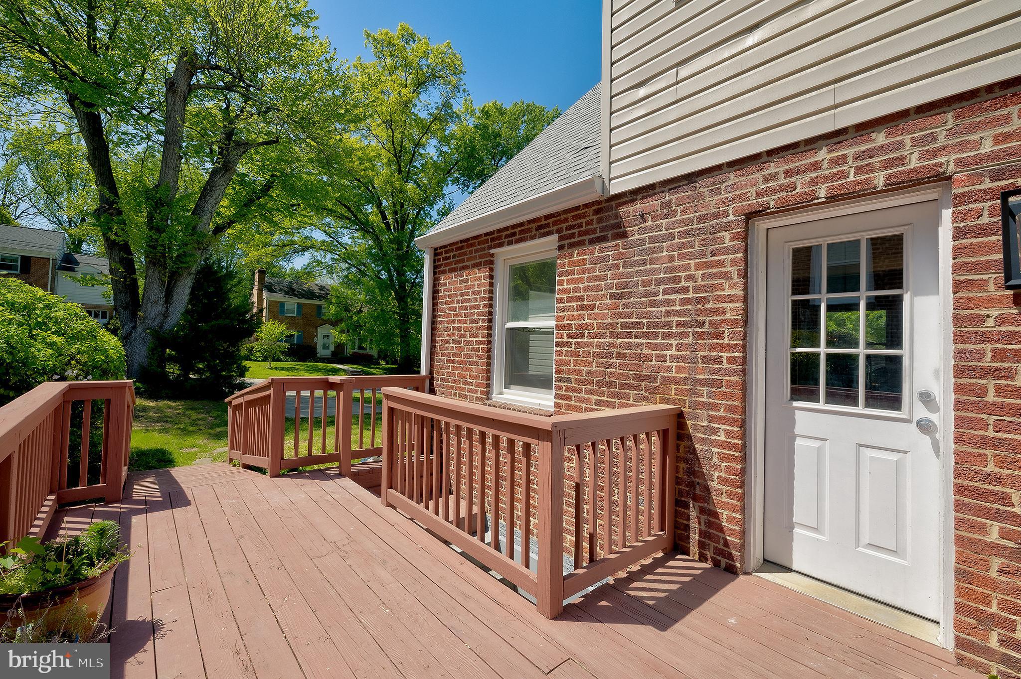 1730 Dublin Drive Silver Spring, MD 20902 - Photo 42 of 50 a view of house with deck and trees