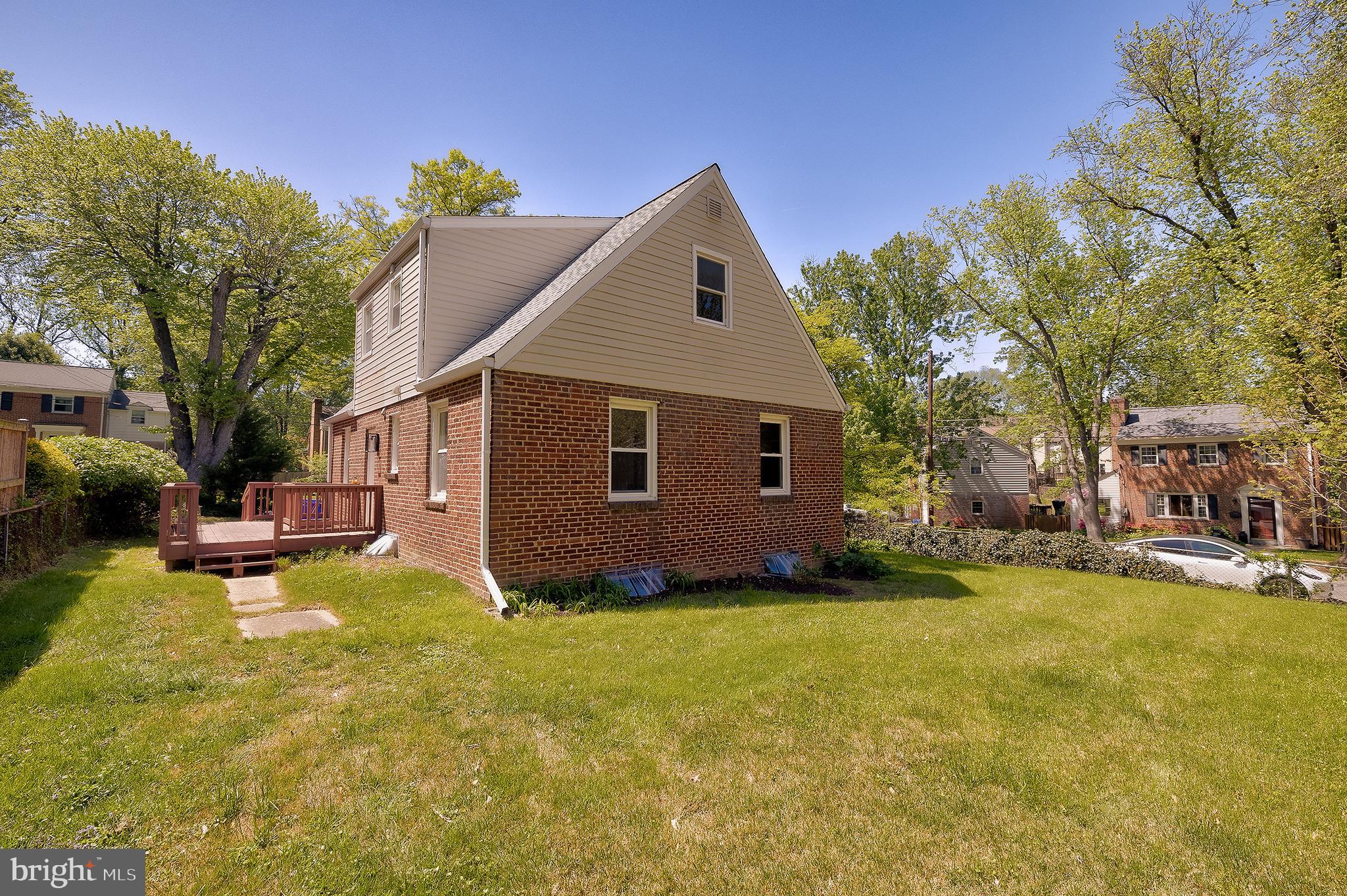 1730 Dublin Drive Silver Spring, MD 20902 - Photo 44 of 50 a view of a house with swimming pool and a yard