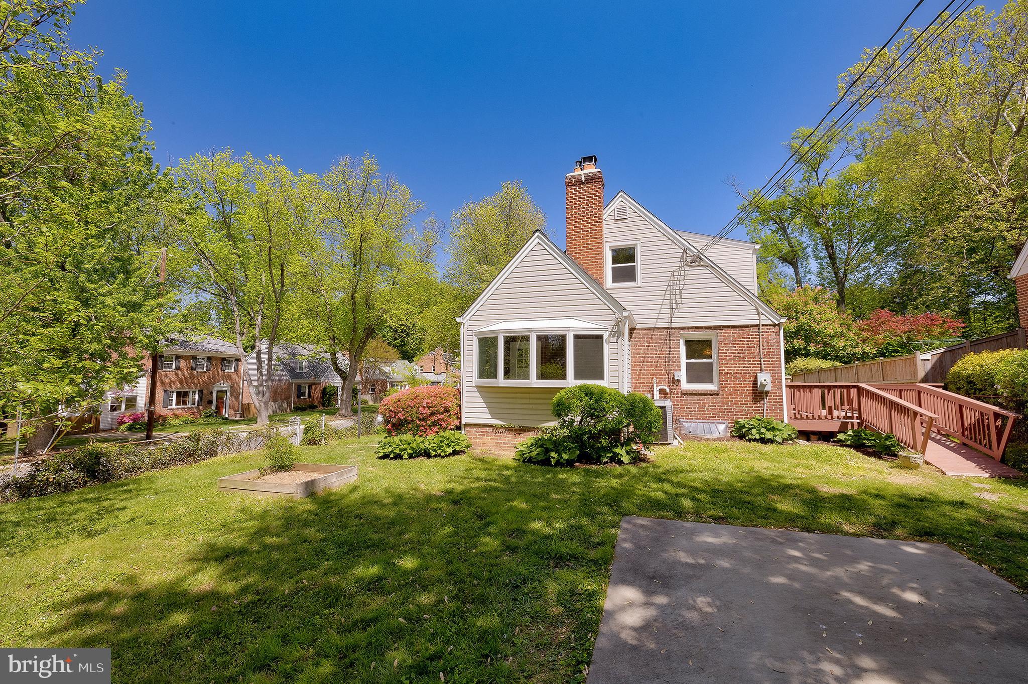 1730 Dublin Drive Silver Spring, MD 20902 - Photo 47 of 50 a front view of a house with garden