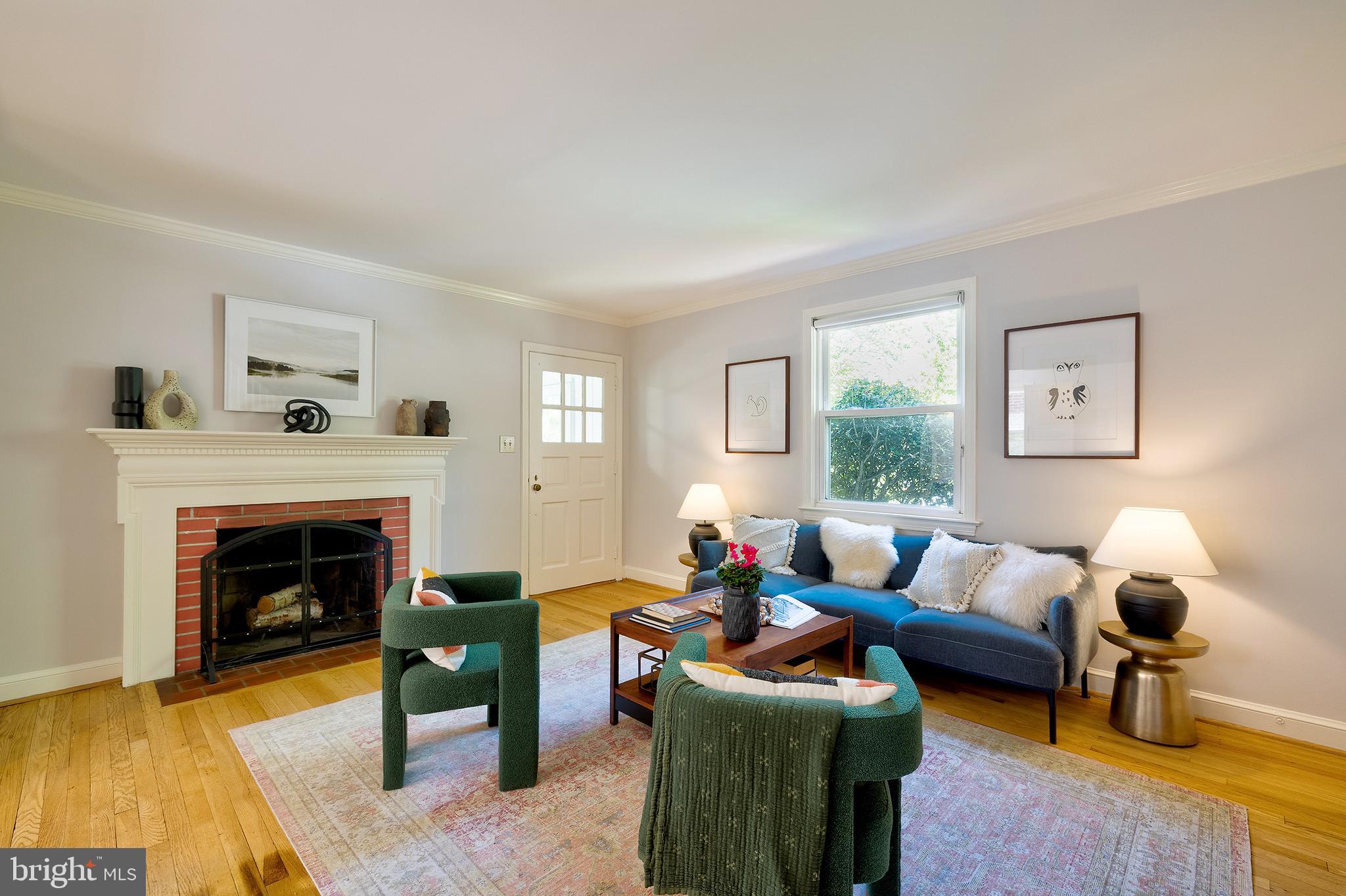1730 Dublin Drive Silver Spring, MD 20902 - Photo 8 of 50 a living room with furniture and a fireplace