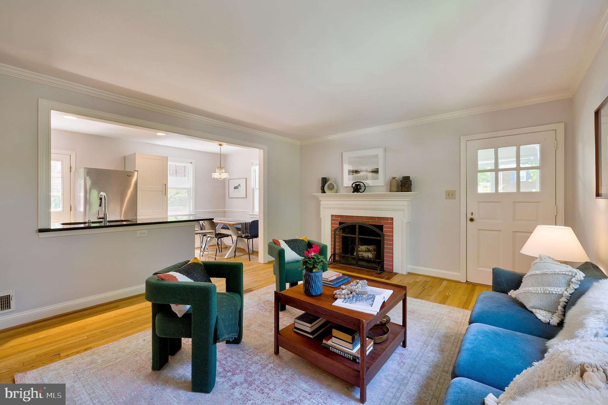 1730 Dublin Drive Silver Spring, MD 20902 - Photo 9 of 50 a living room with furniture and a fireplace