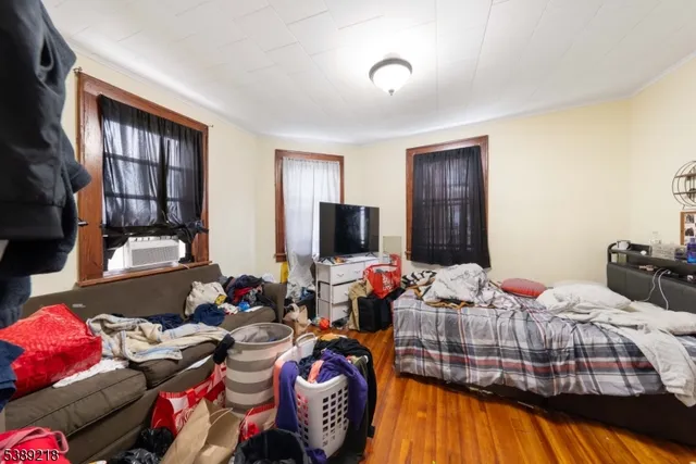 a bed room with furniture and a window