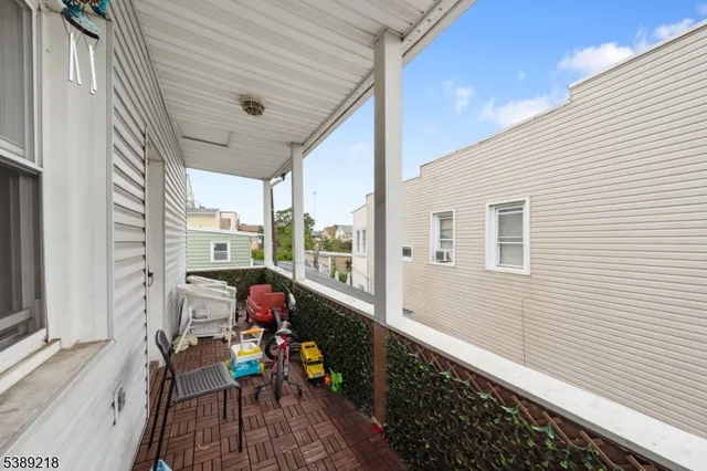a living room with furniture a washer and dryer