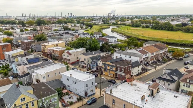 an aerial view of a city with lake view
