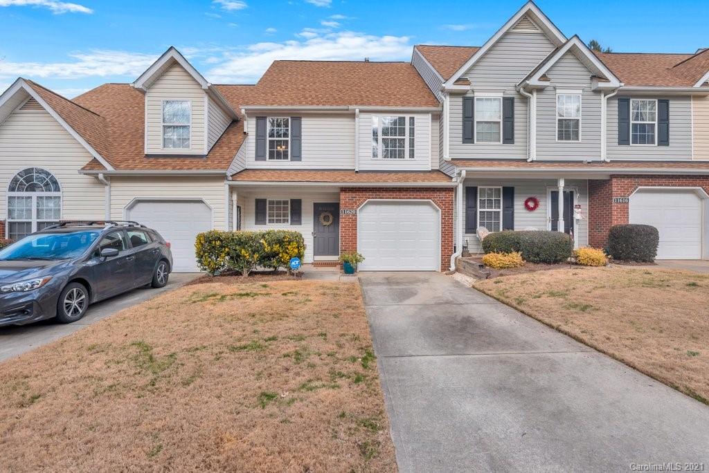 11620 Rabbit Ridge Road Charlotte, NC 28270 - Photo 2 of 24 a front view of a house with a yard