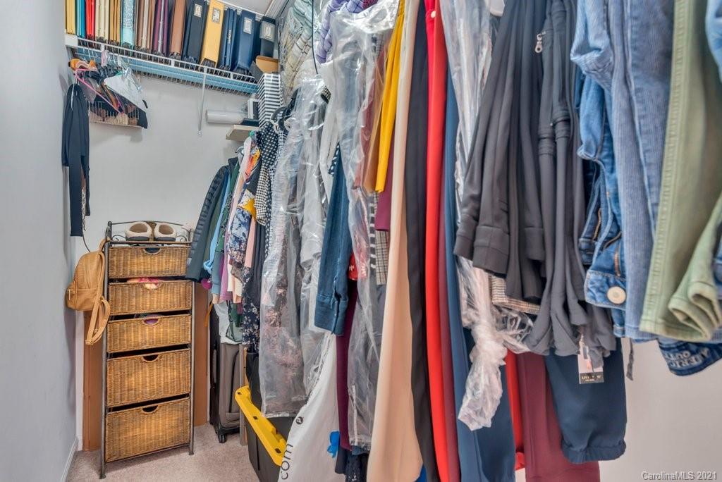 11620 Rabbit Ridge Road Charlotte, NC 28270 - Photo 12 of 24 a view of walk in closet with clothes and shoes
