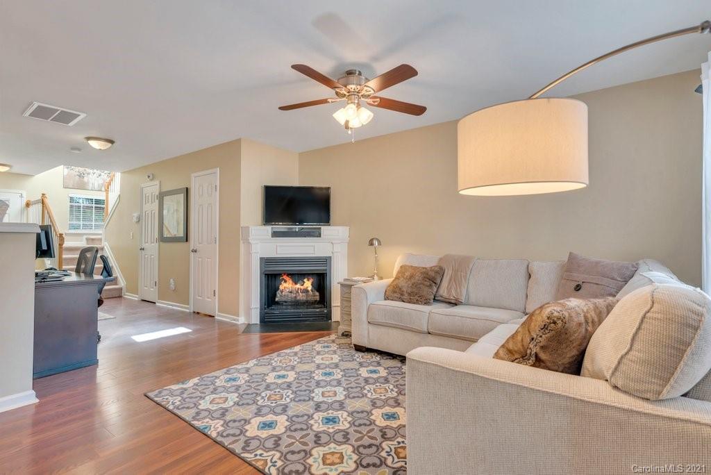 11620 Rabbit Ridge Road Charlotte, NC 28270 - Photo 6 of 24 a living room with furniture and a fireplace