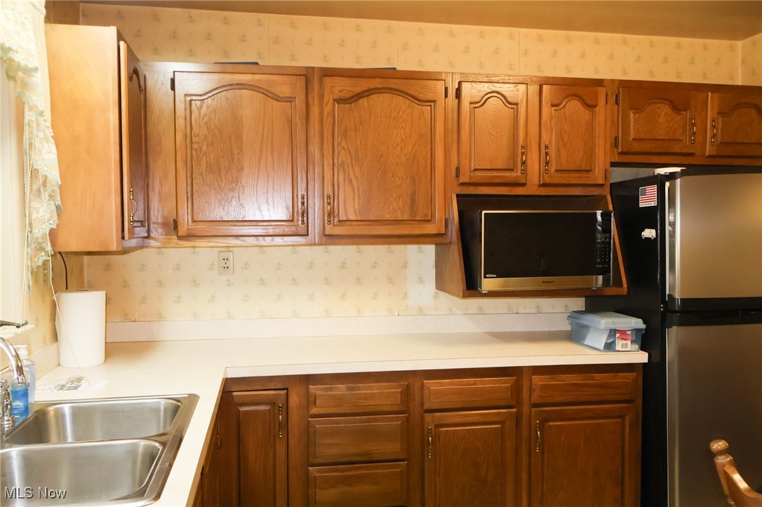 6637 Center Road Ashtabula, OH 44004 - Photo 31 of 44 Kitchen featuring stainless steel appliances and sink