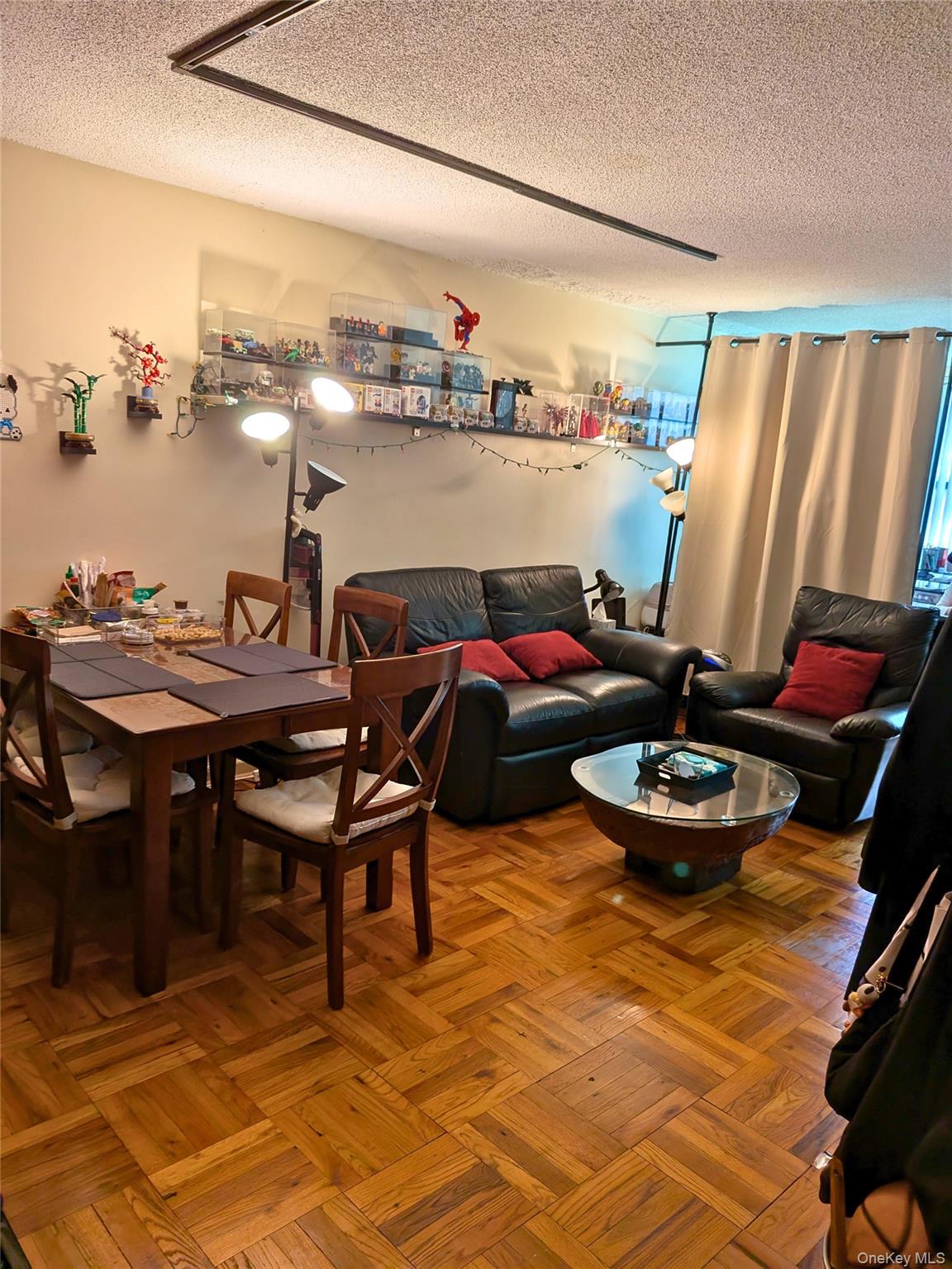 75-24 Bell Boulevard, Unit LD Queens, NY 11364 - Photo 11 of 19 a view of a dining room with furniture