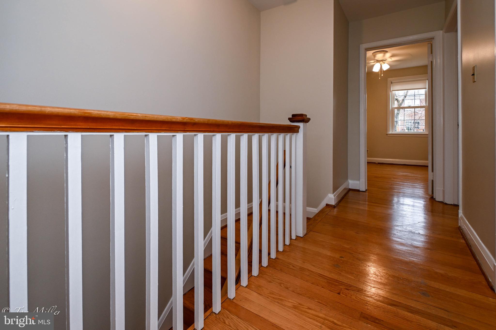 127 Stanmore Road Baltimore, MD 21212 - Photo 12 of 37 Upper Level Hall w/ Hardwood Floors