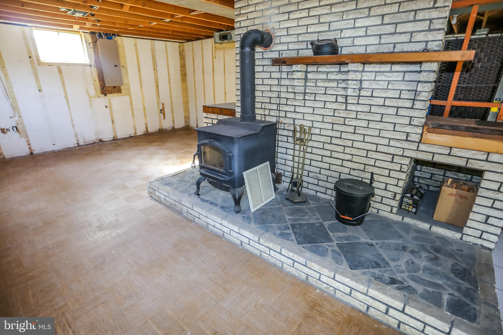3529 Courtney School Road Midland, VA 22728 - Photo 16 of 28 Wood stove conveys