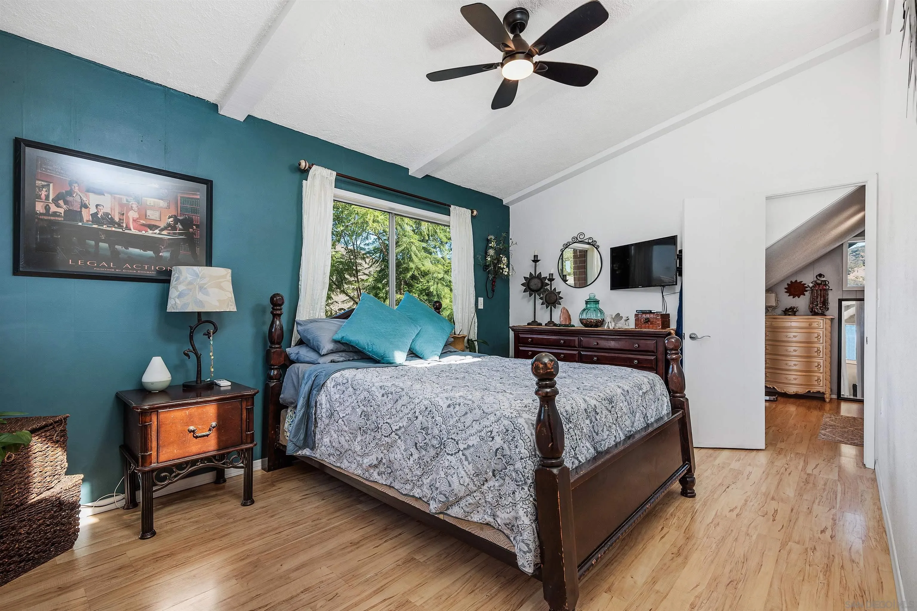 11270 San Luis Rey Drive Valley Center, CA 92082 - Photo 22 of 56 a bedroom with a bed and a tv on table