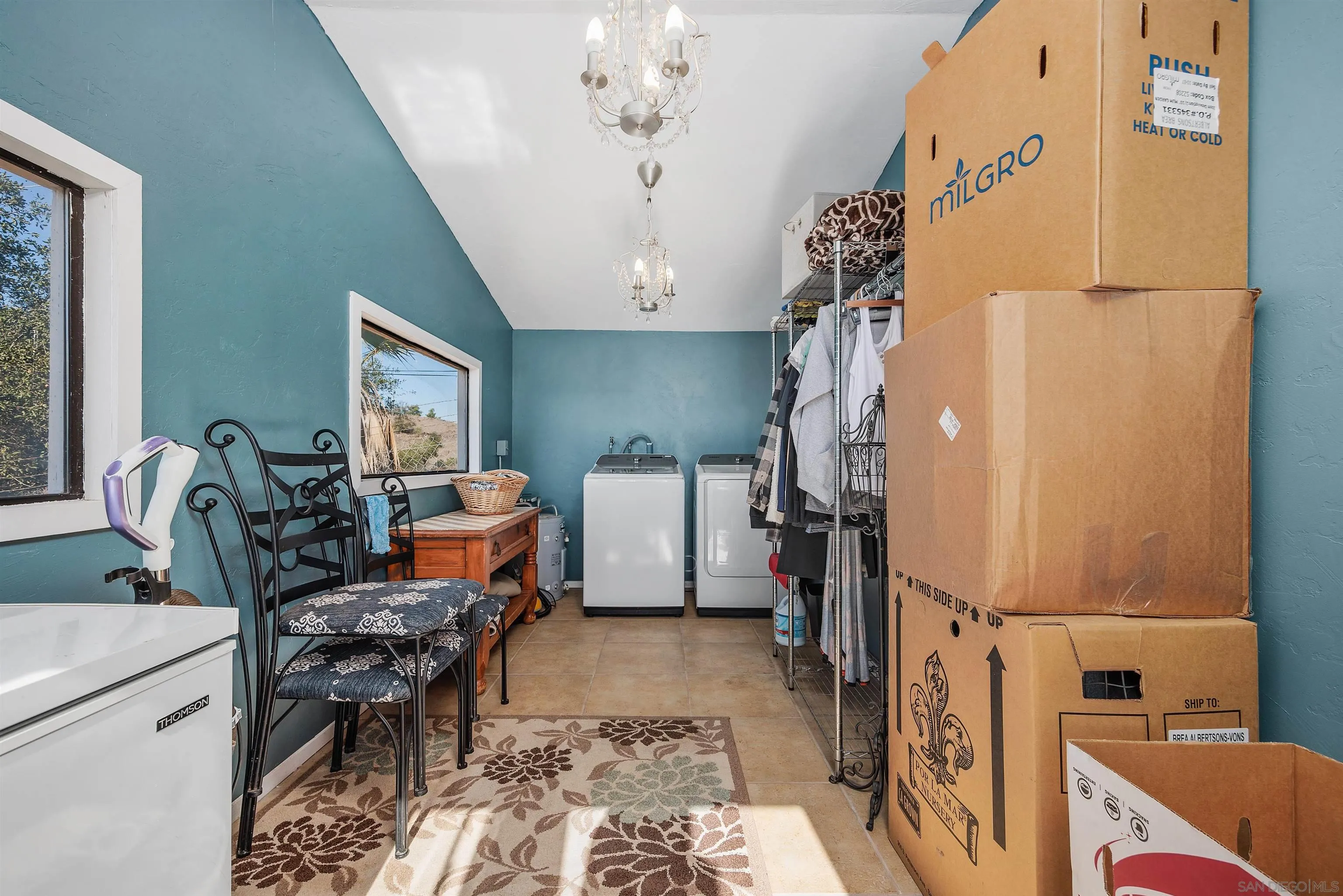 11270 San Luis Rey Drive Valley Center, CA 92082 - Photo 37 of 56 a living room with furniture and a baby crib