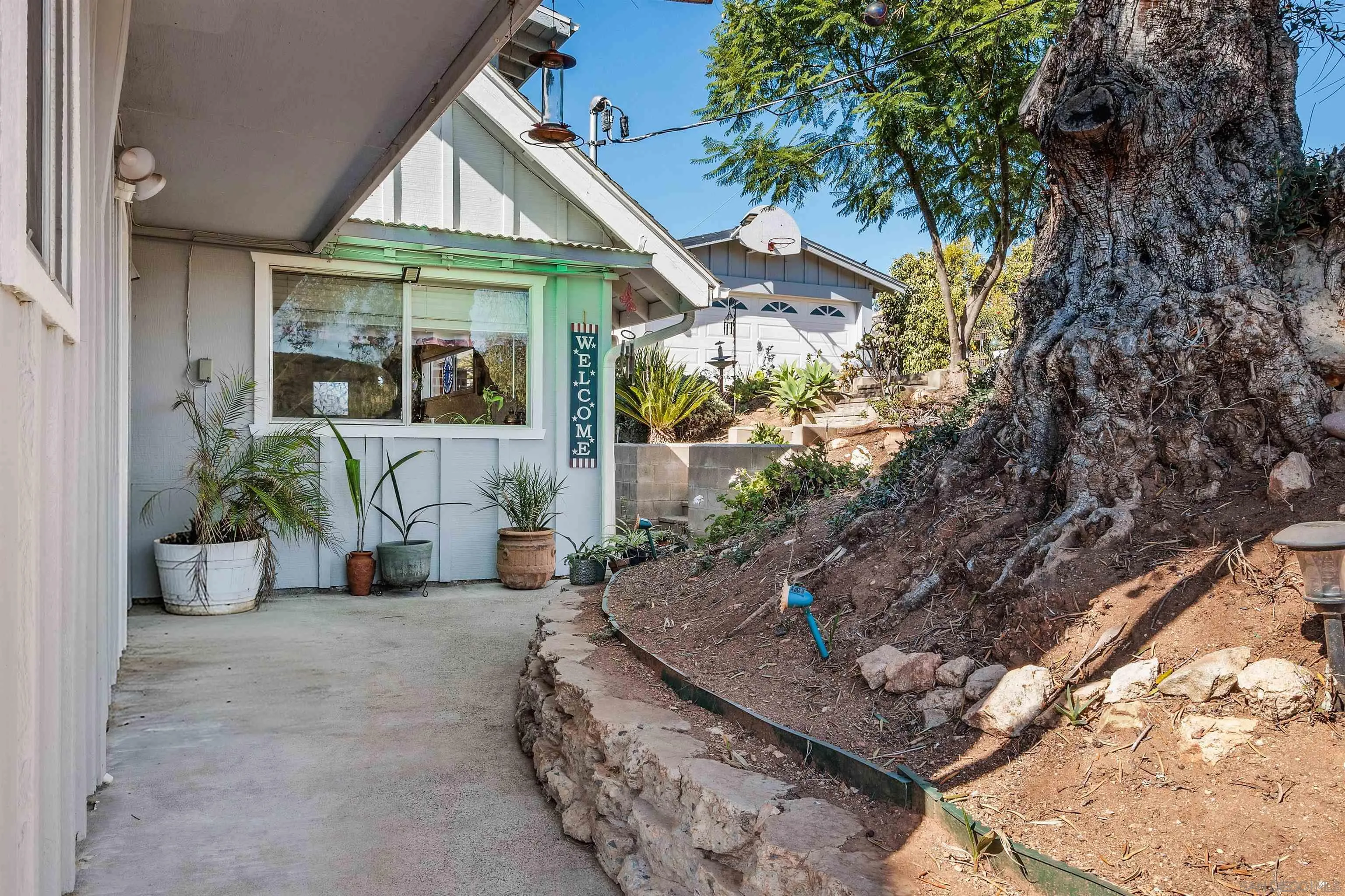 11270 San Luis Rey Drive Valley Center, CA 92082 - Photo 8 of 56 a view of a house with backyard and sitting area