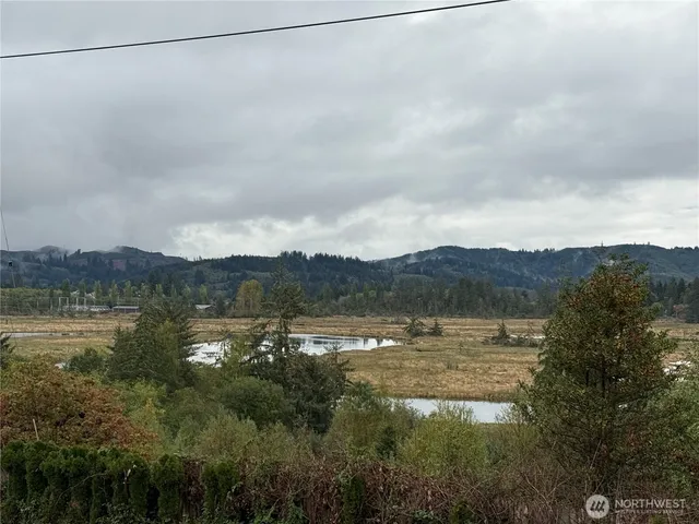 a view of lake with mountain