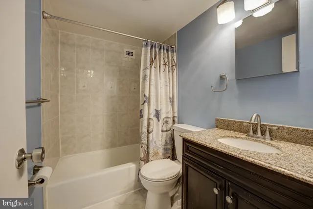 a view of street with parked cars