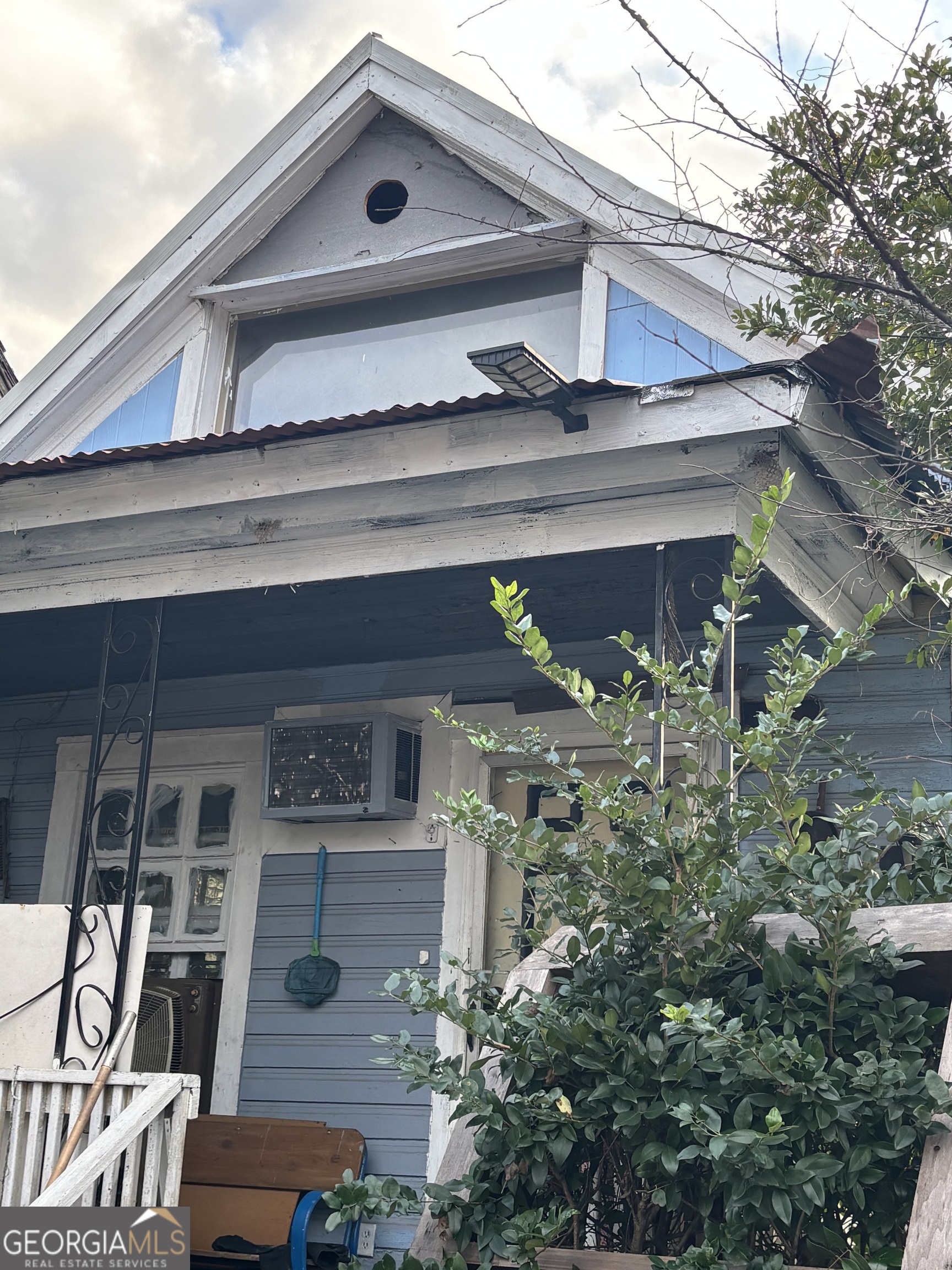 356 Stratton Street Macon, GA 31201 - Photo 3 of 3 a view of a house with a small yard and large tree