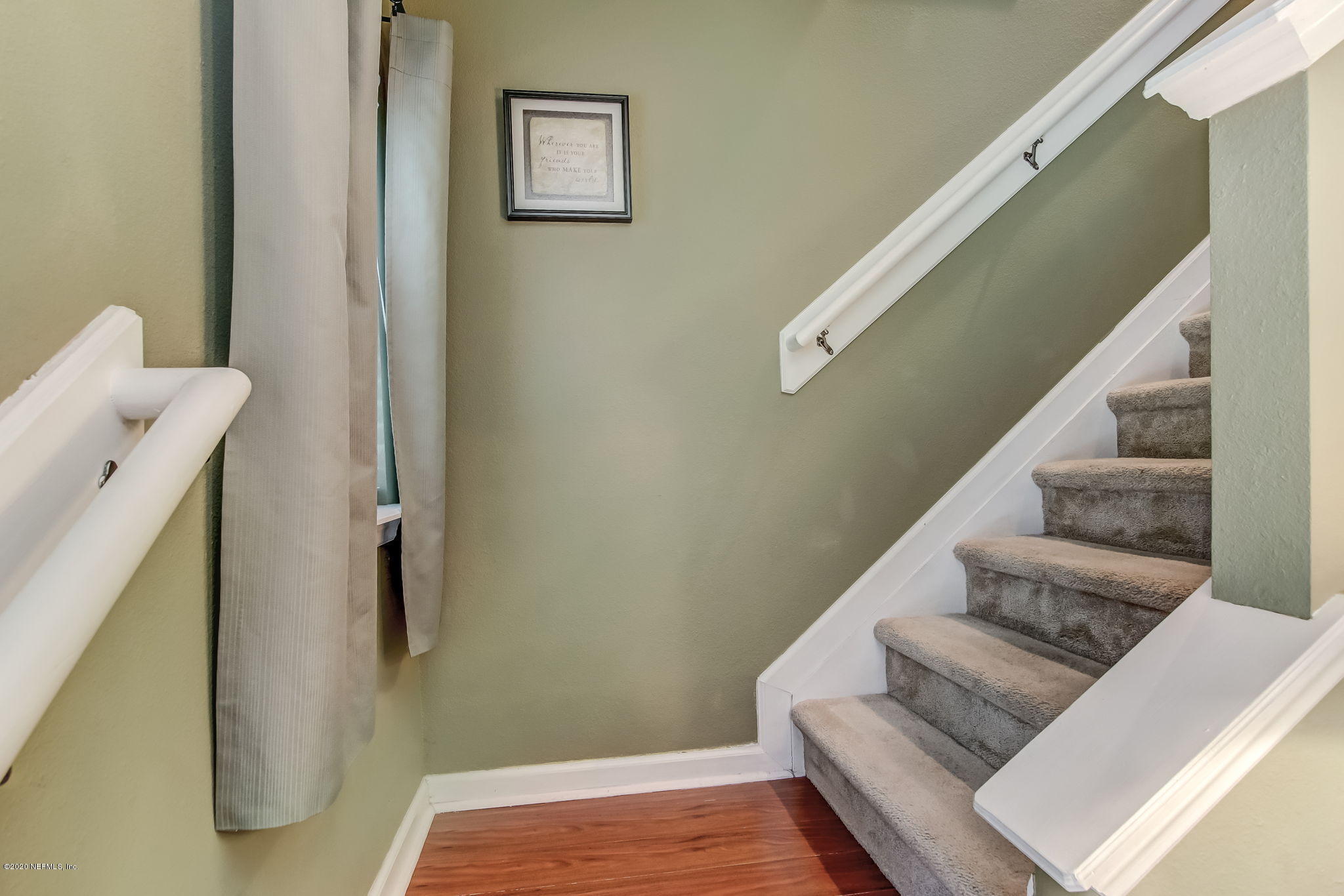 4816 Playschool Drive Jacksonville, FL 32210 - Photo 13 of 49 a view of entryway and hall with wooden floor