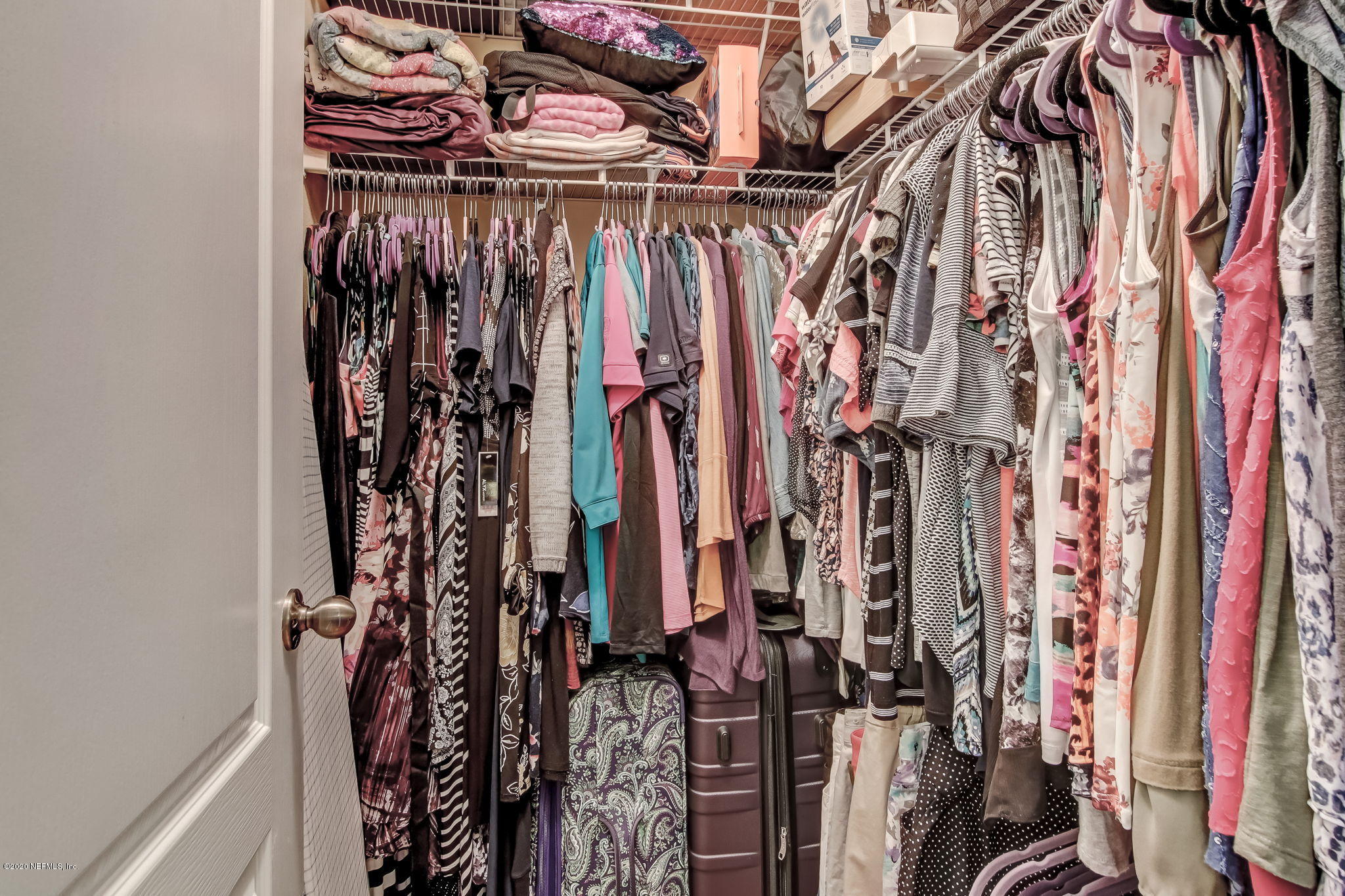 4816 Playschool Drive Jacksonville, FL 32210 - Photo 19 of 49 a view of walk in closet with clothes