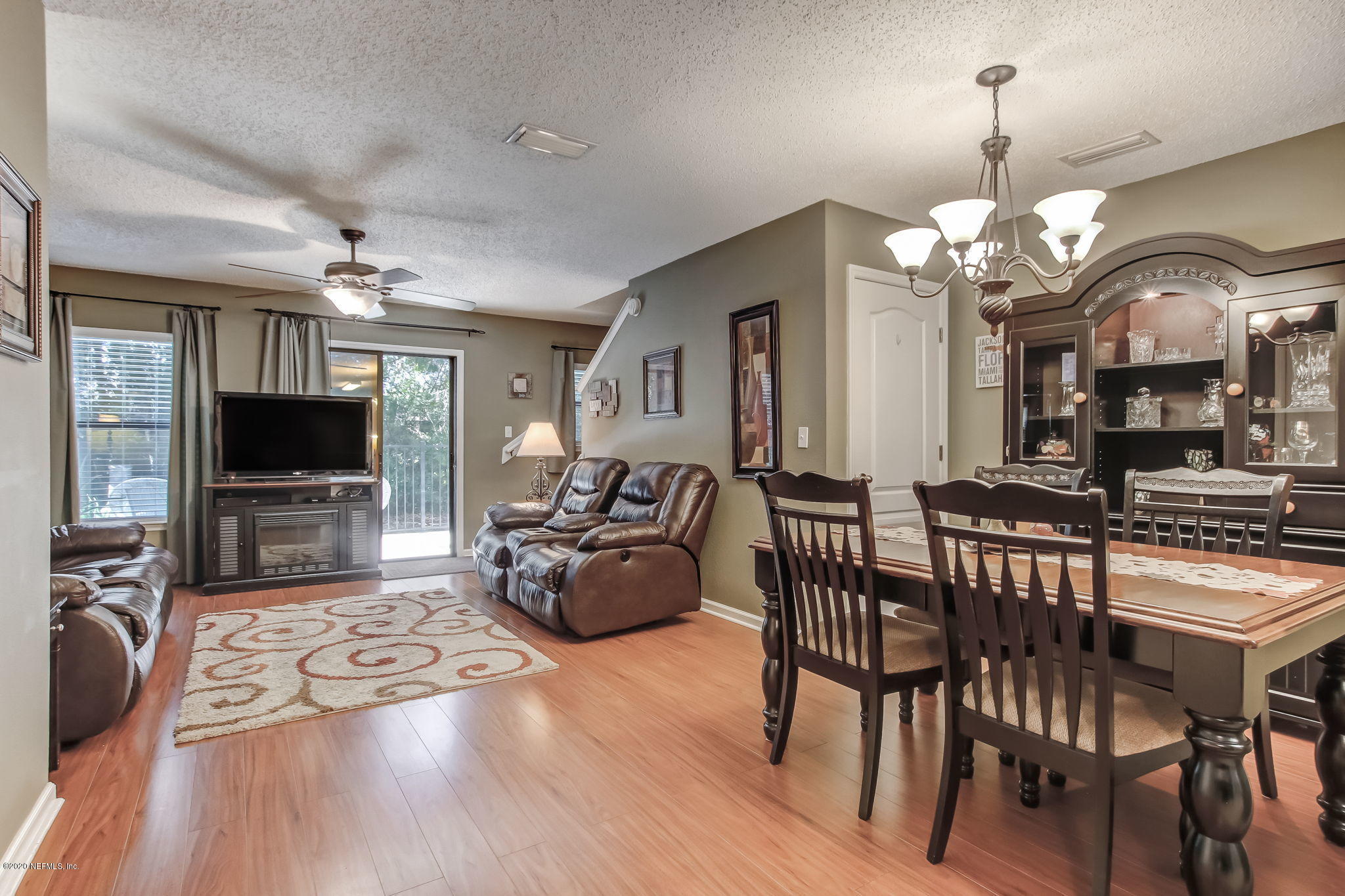4816 Playschool Drive Jacksonville, FL 32210 - Photo 34 of 49 a view of a livingroom with furniture window and wooden floor