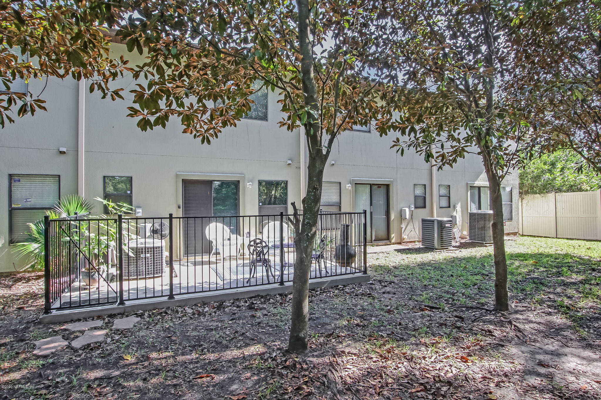 4816 Playschool Drive Jacksonville, FL 32210 - Photo 43 of 49 a front view of a house with garden