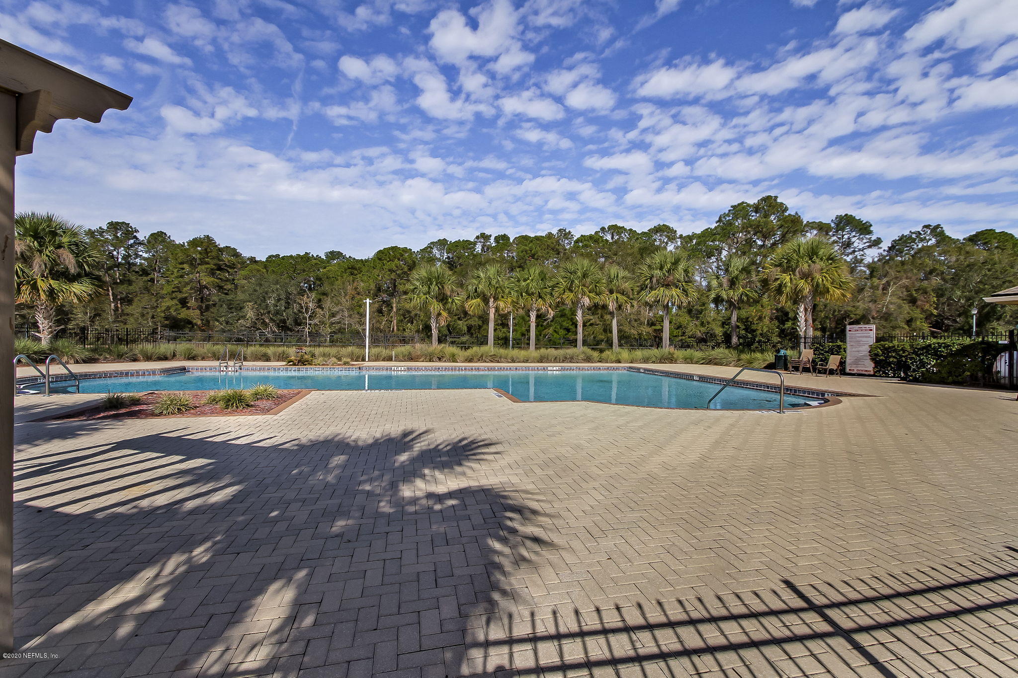 4816 Playschool Drive Jacksonville, FL 32210 - Photo 45 of 49 a view of a swimming pool and a yard