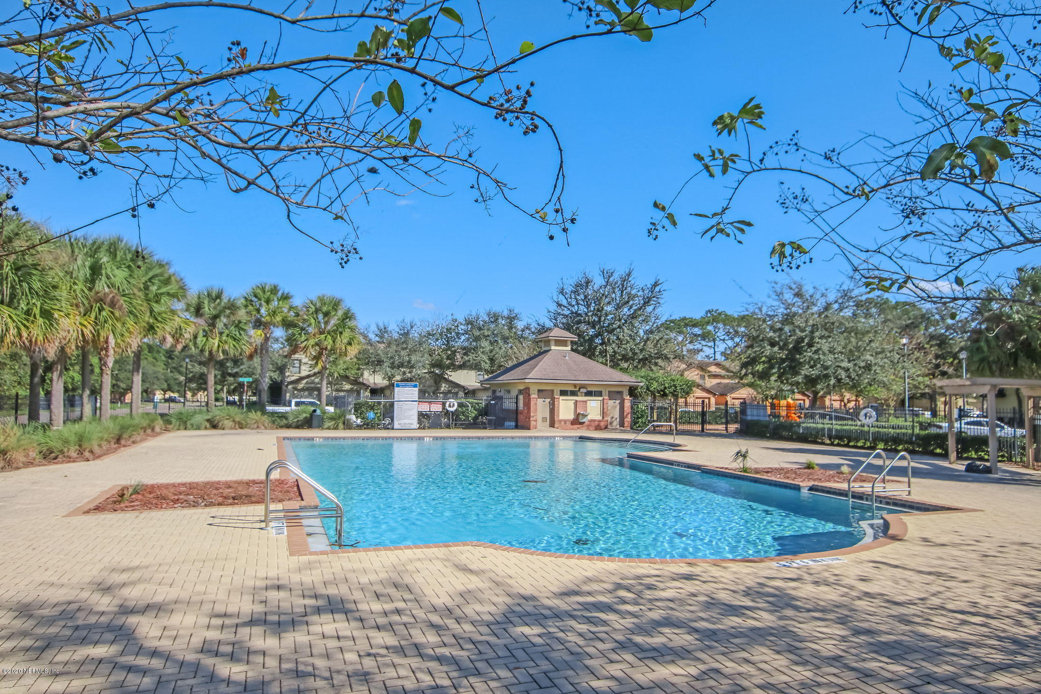 4816 Playschool Drive Jacksonville, FL 32210 - Photo 47 of 49 a view of a swimming pool with a yard