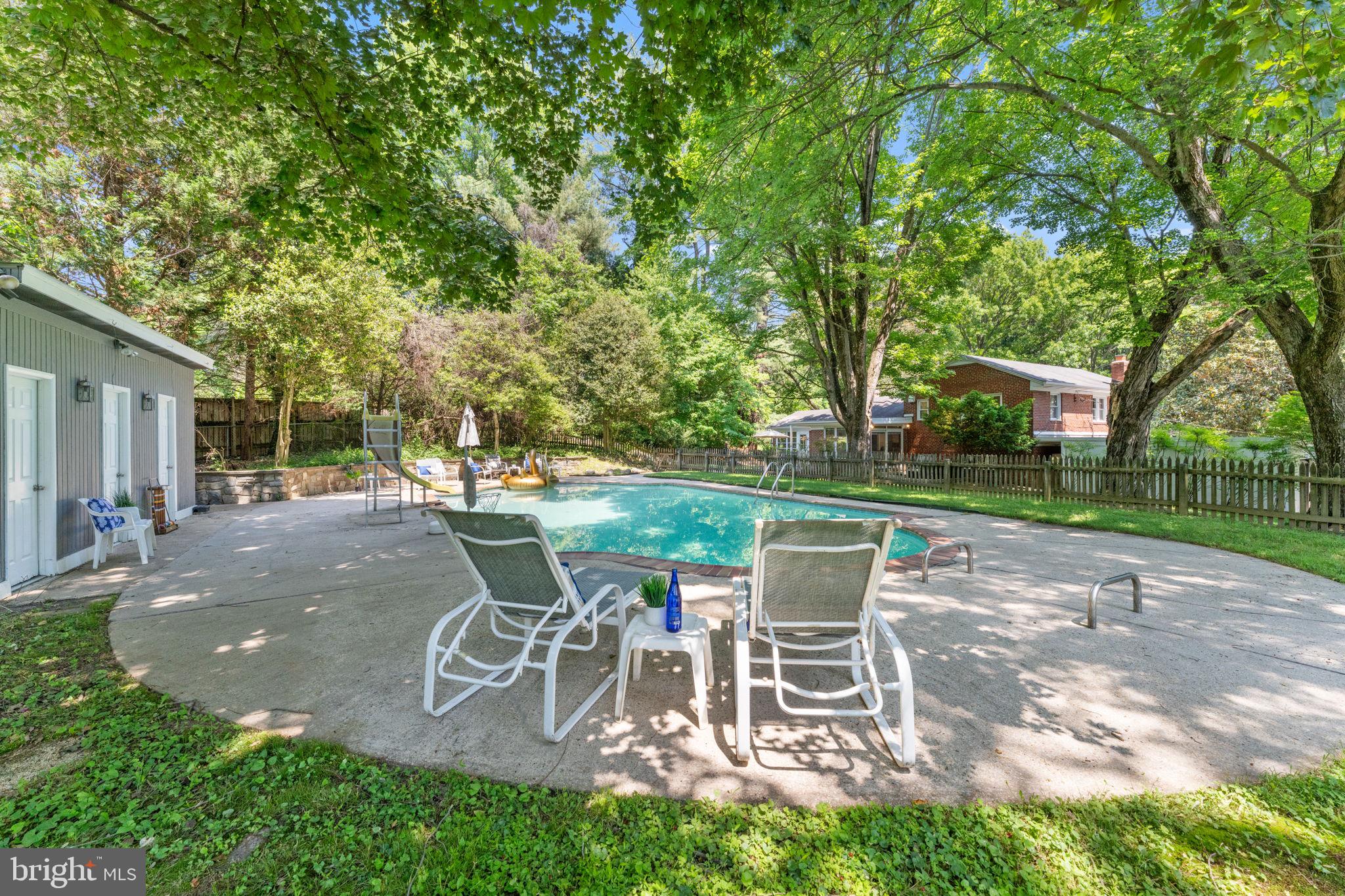 11712 Berwick Road Silver Spring, MD 20904 - Photo 24 of 42 a view of a table and chairs in patio with a yard