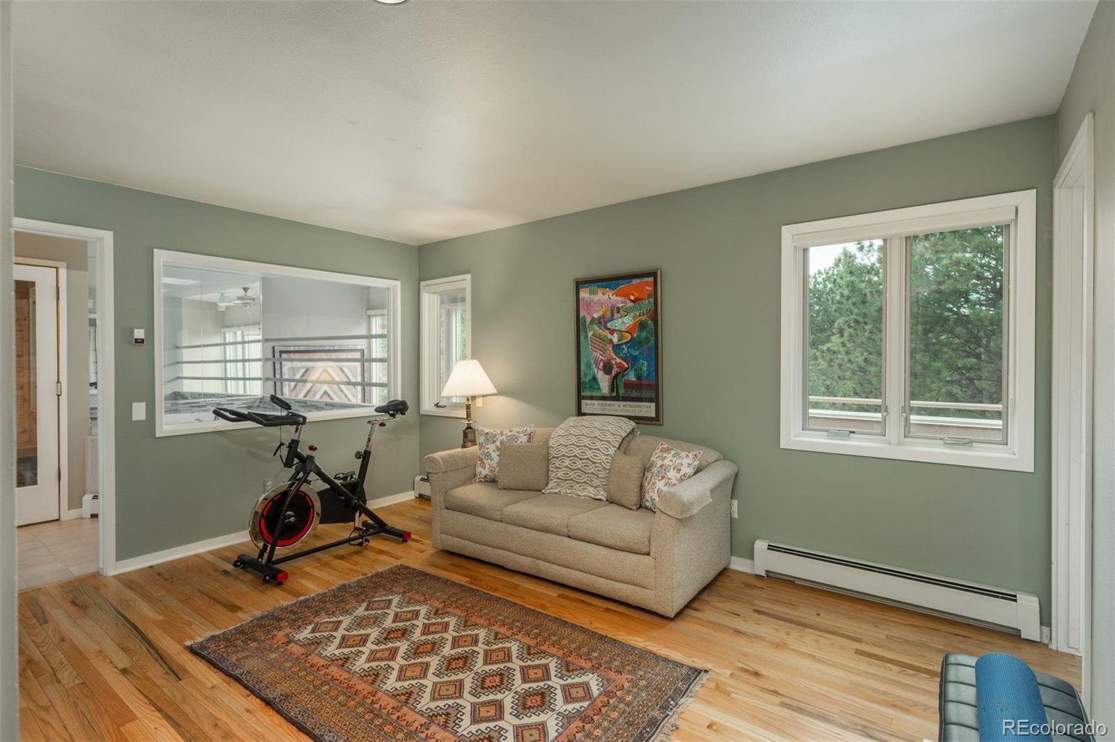1551 Genesee Ridge Road Golden, CO 80401 - Photo 28 of 50 a living room with furniture and a window