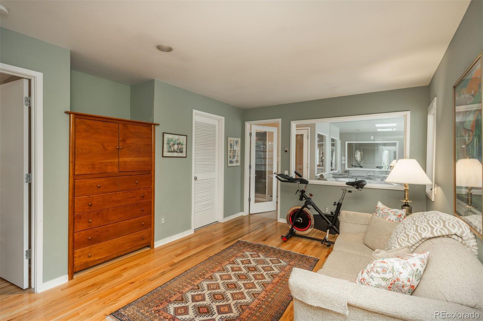 1551 Genesee Ridge Road Golden, CO 80401 - Photo 29 of 50 a living room with furniture and a window