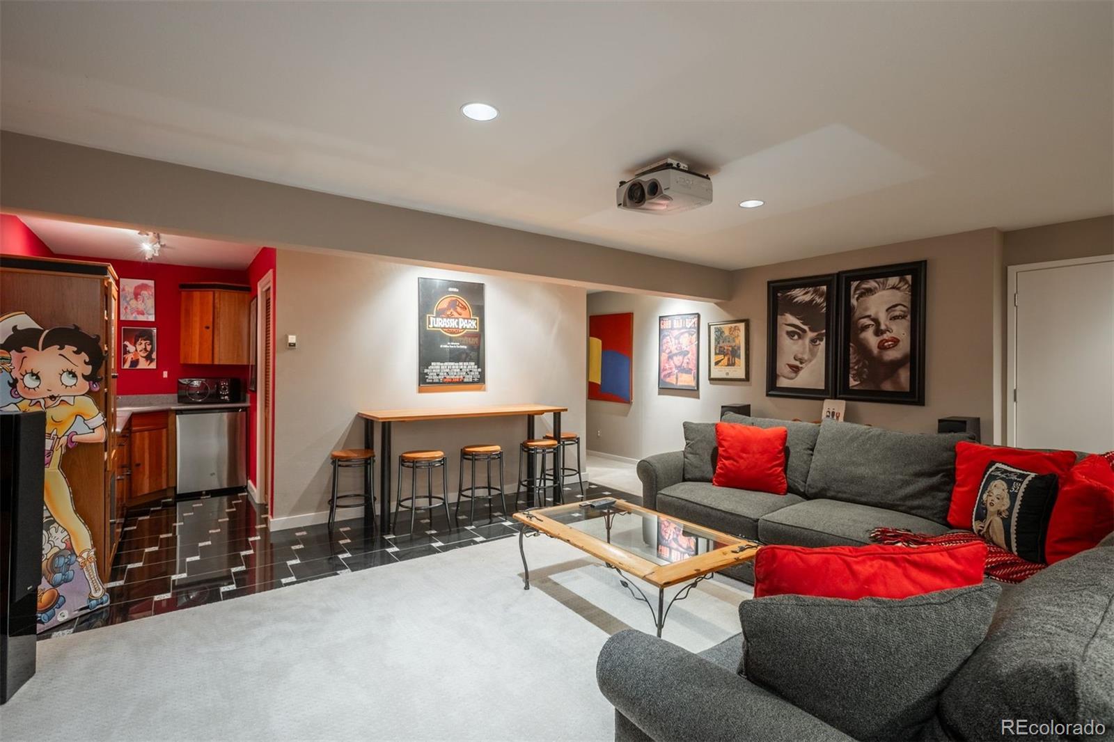 1551 Genesee Ridge Road Golden, CO 80401 - Photo 38 of 50 a living room with furniture and a flat screen tv